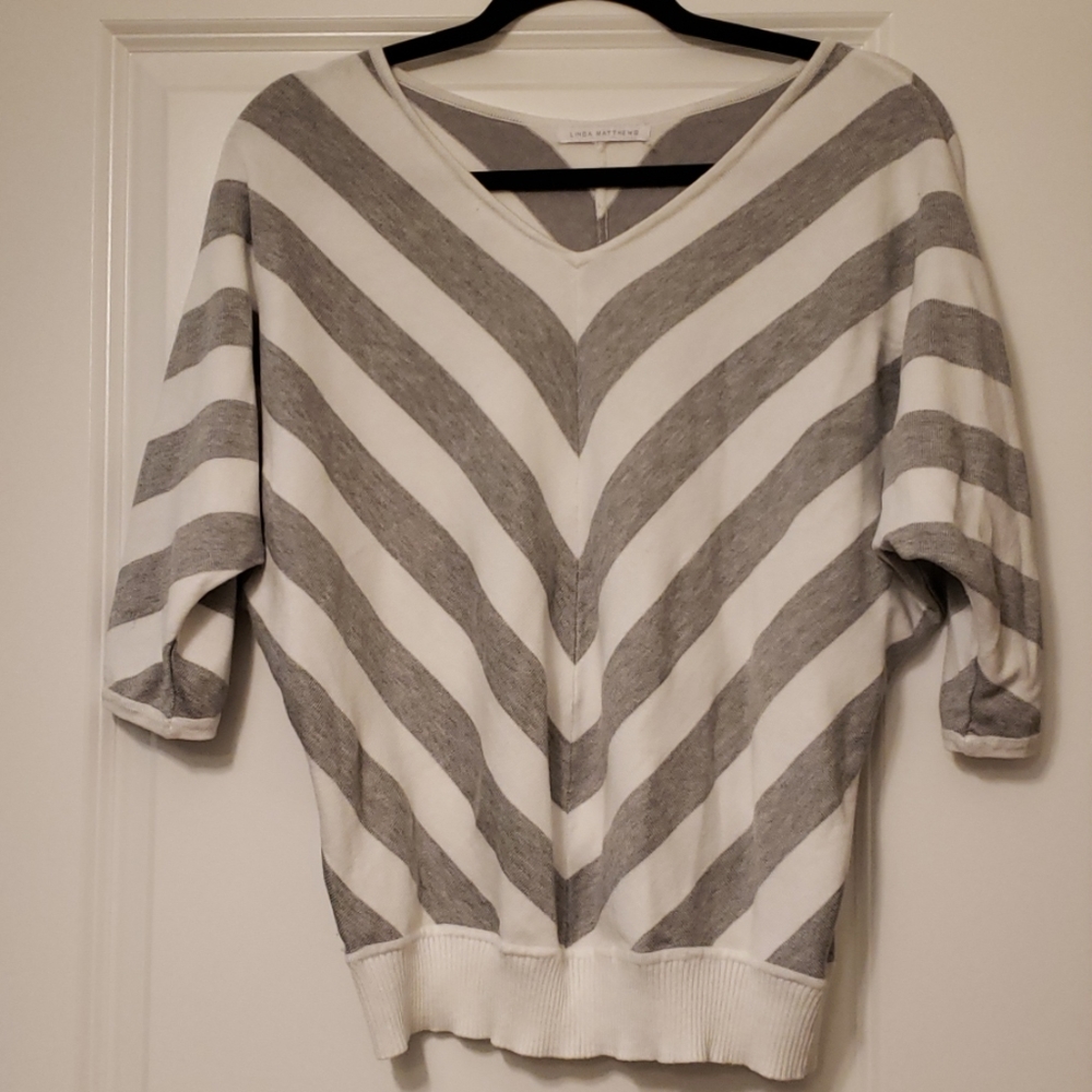 Grey and white sweater